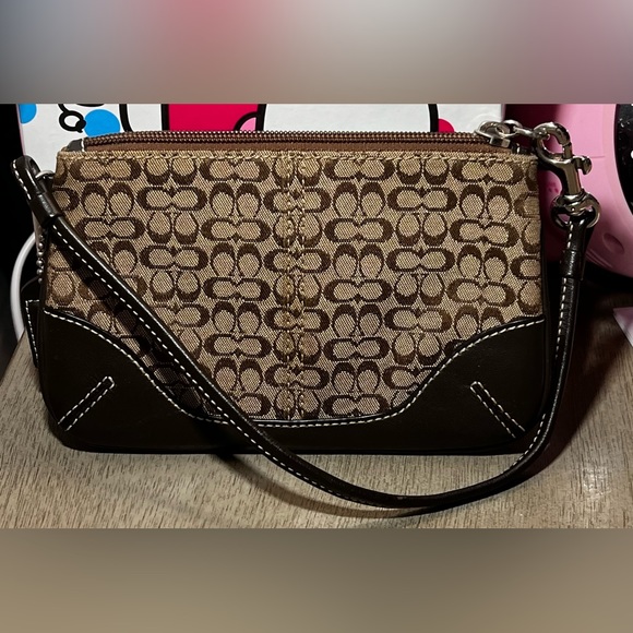 Coach wristlet small cc pattern on brown jacquard with dark brown leather trim. - Picture 2 of 7